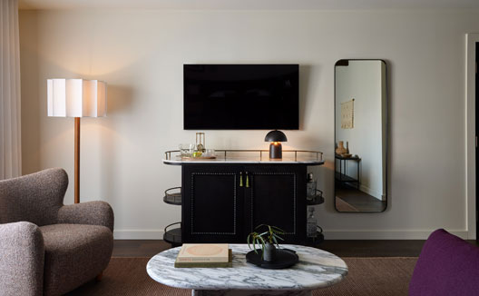 Kimpton Mirador Hotel Studio Spa Suite sitting area with TV